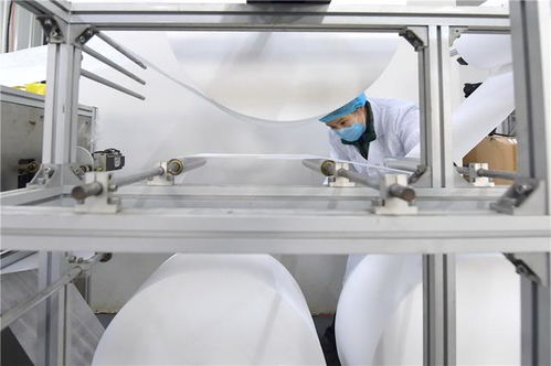 河北唐山 加緊生產防護用品 助力抗擊肺炎疫情